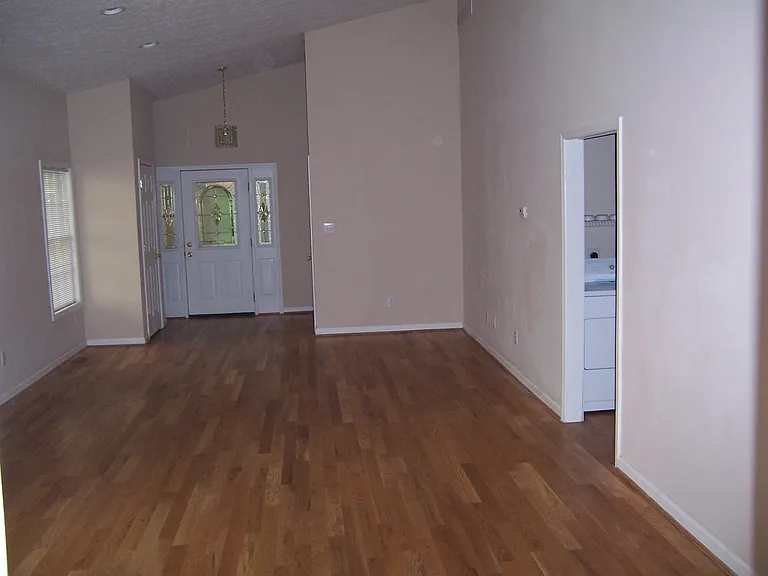 Huge living room with great hardwood floor.