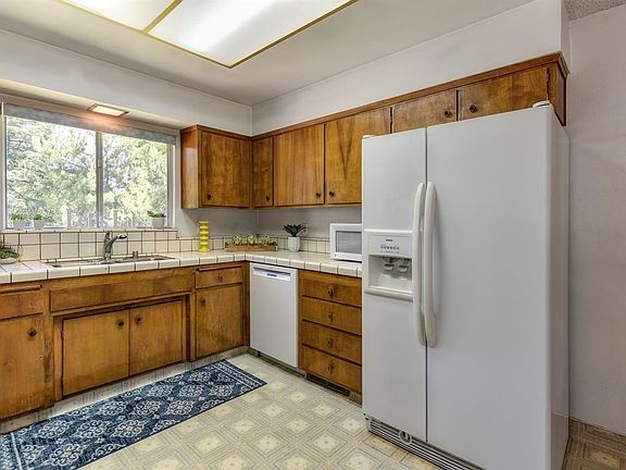 Purchase includes Refrigerator. Nice view from Kitchen window