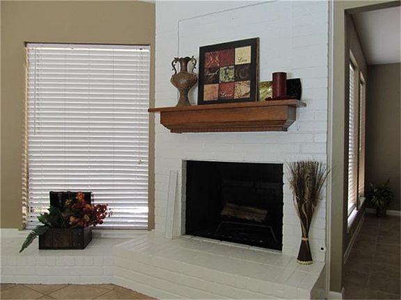 OPEN CONCEPT LIVING  ROOM WITH FIRE PLACE