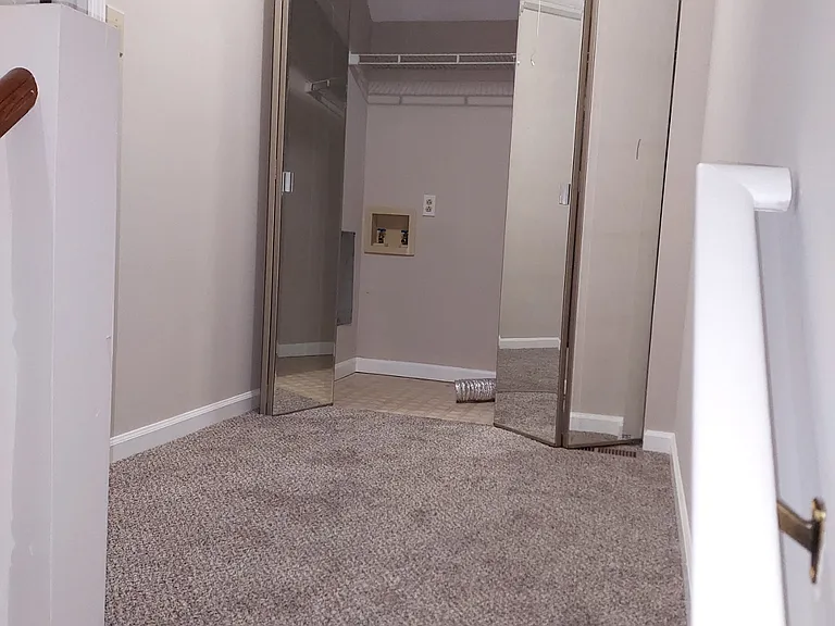 washer/dryer hookups at the top of the stairs
