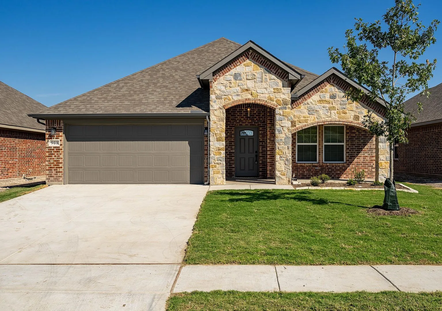 Modern Open-Concept 3-Bedroom Home with Premium Upgrades & Private Suite — Photo 1