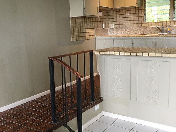 Step up to kitchen and bedroom