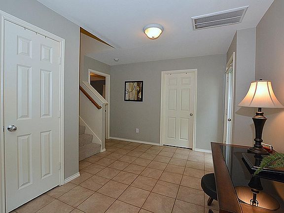 The large entry foyer opens to the backyard.