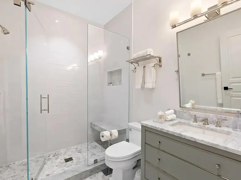 The rain shower is the perfect way to rejuvenate in this modern retreat.