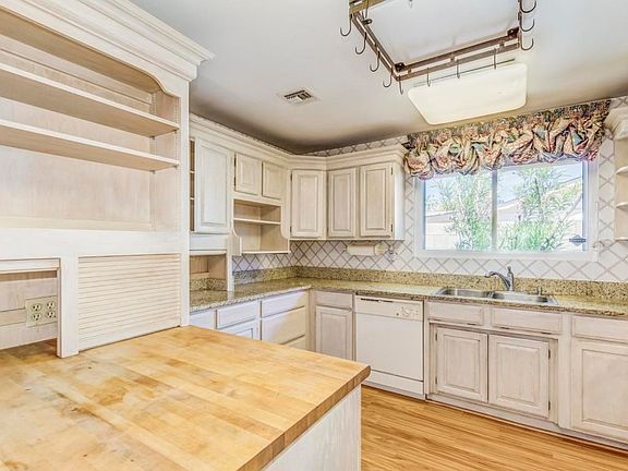 GRANITE COUNTERS AND STORAGE GALORE