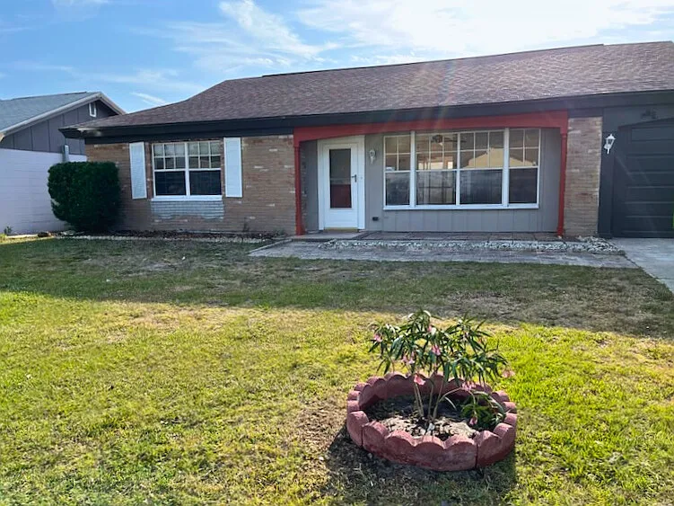 Front yard; garage door; main entry.