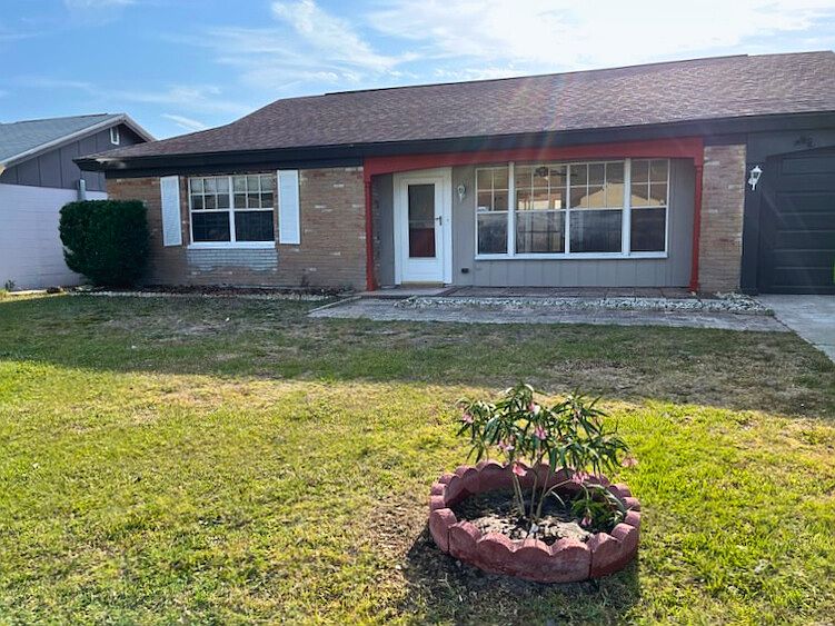 Front yard; garage door; main entry.