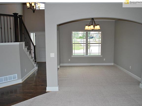 Hardwood will go all the way to the columns, then will be Carpet in this Flex room aka Den.
