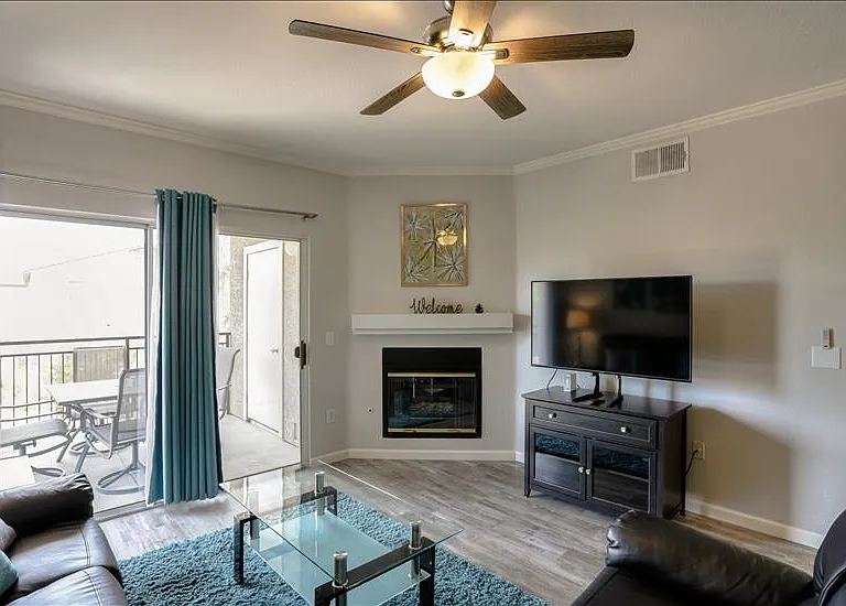 Beautiful Living Room with Gas Fireplace and 50" Smart TV