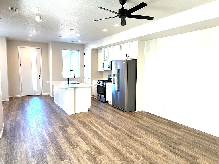 Living room looking in kitchen
