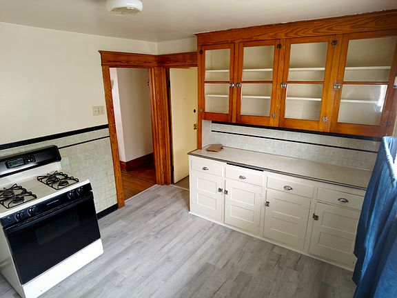 Kitchen - beautiful hardwood cabinets full of character