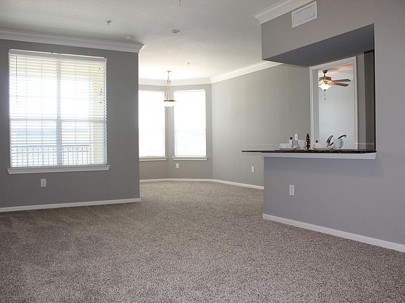 This is the view from the living area to the dining area and kitchen.