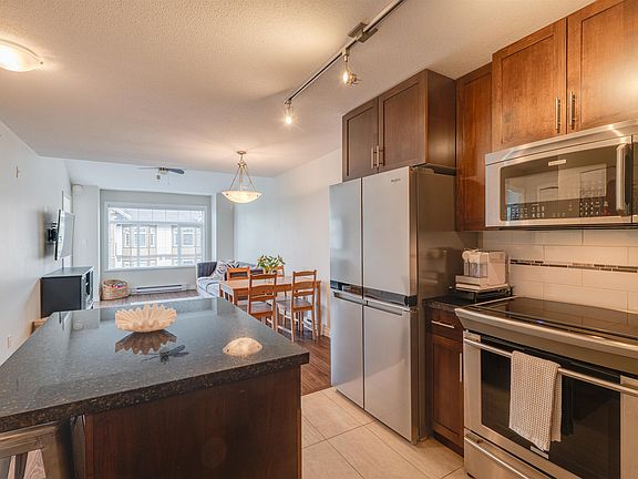 2nd image of 5650 201a St #423