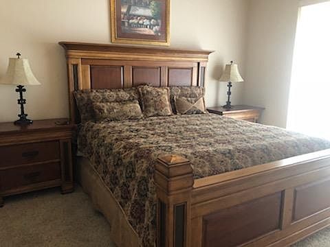 Master bedroom with slider out to patio