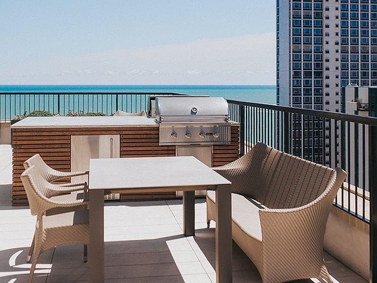 Two community grills and tables