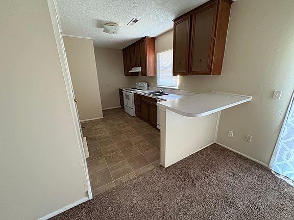 5th image of 9011 E 46th Pl