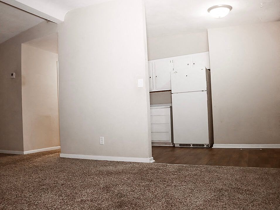 Living Area with Connected Kitchen