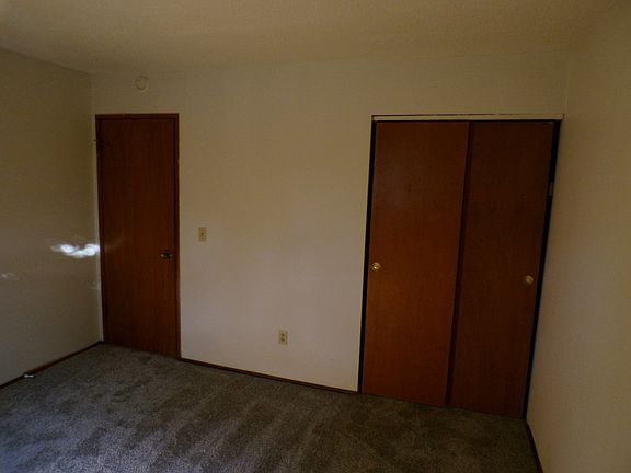 The primary bedroom doorway and closet.