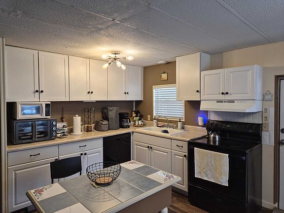 4th image of 9109 Rawlins Ave