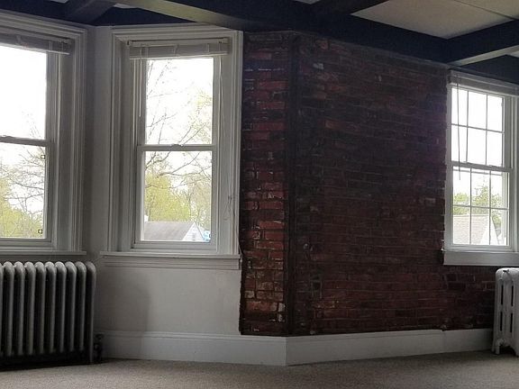 Lrg. Living Rm with exposed brick wall