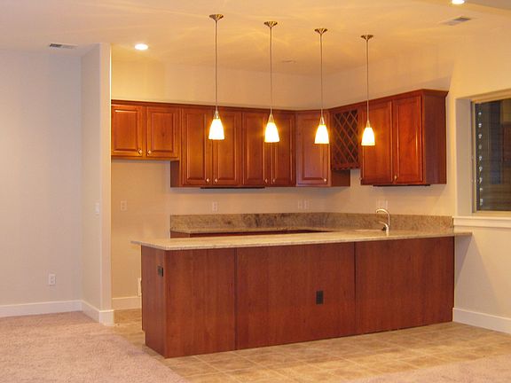 Fin. bsmt w/ wet bar, 2bdrms, full bath, game and media rms.