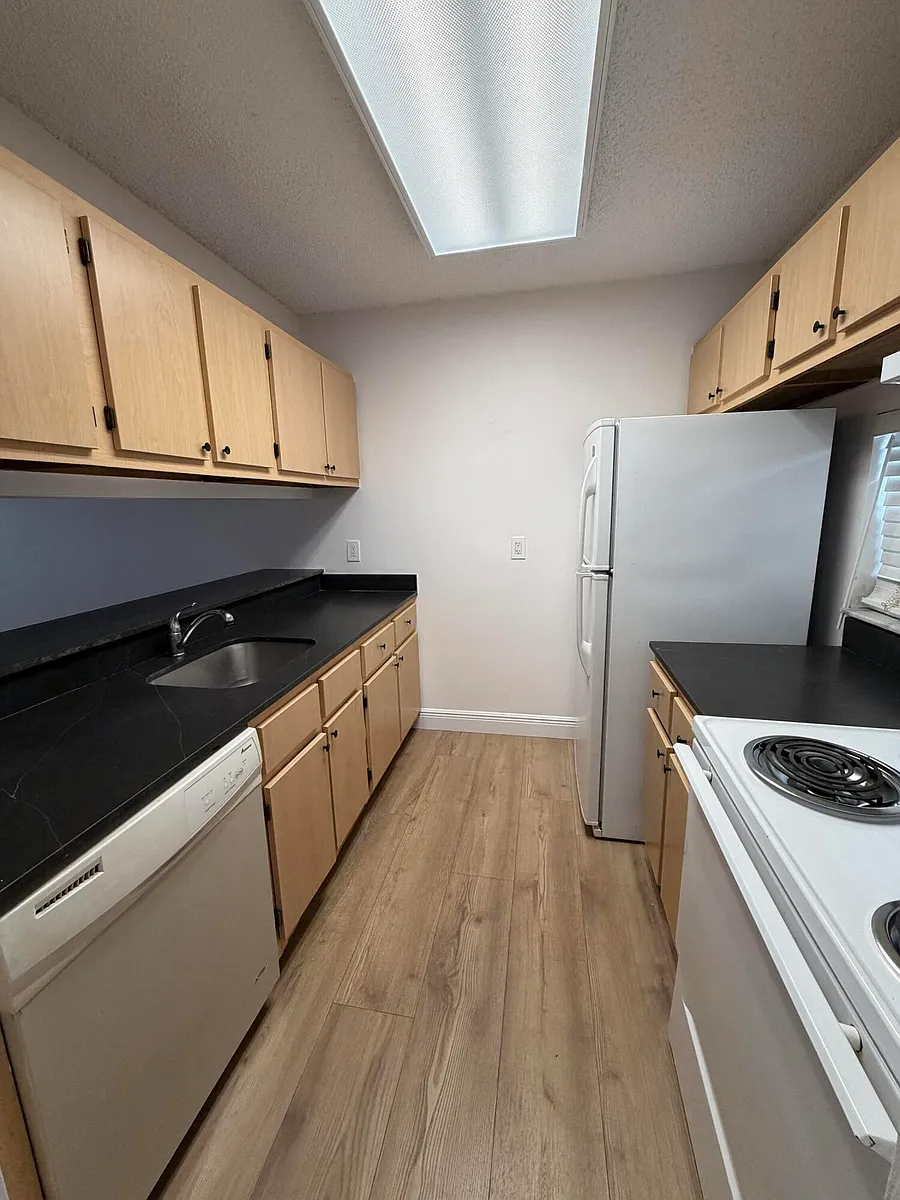 Building Photo - 8720 N Sherman Cir #205
