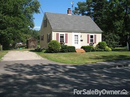 House Front : Front of house as viewed from Pleasant Street. Quiet residential neighborhood.