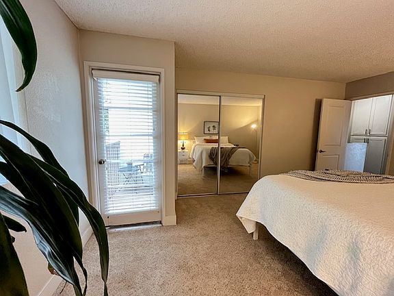 PRIMARY BALCONY DOOR AND CLOSET