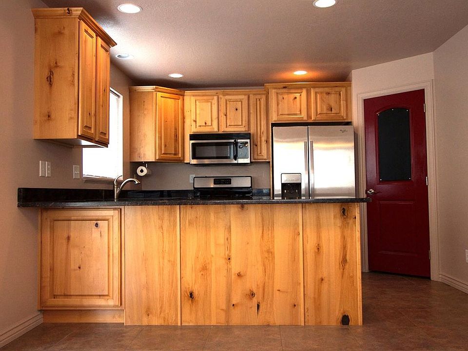 Kitchen featuring granite countertops and stainless steel ap
