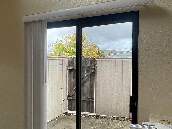 Sliding glass door to patio.