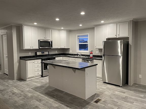 2nd image of 7204 E Grand River Ave #366