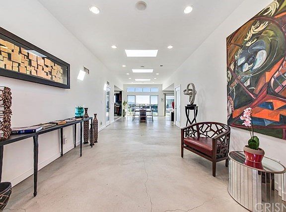 This is what you see when you open the front door! Absolutely amazing! The Formal Entry features four Skylights!