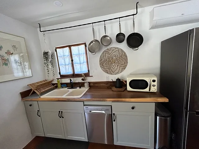 Casita kitchen built-in water filter, dishwasher and microwave.