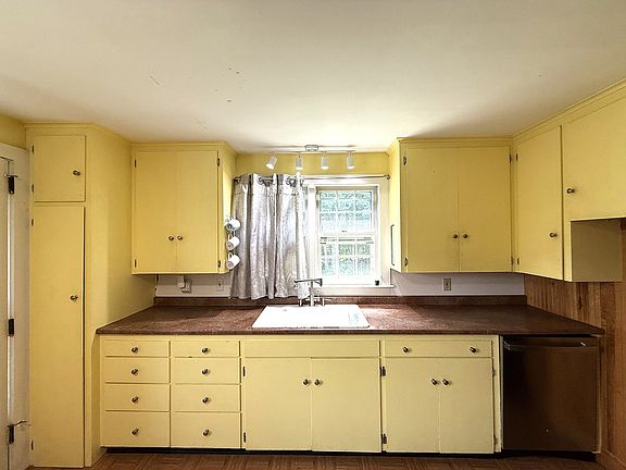 Double Kitchen sink and plenty of storage in the cabinet