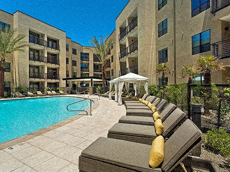 Two refreshing pools with cabanas