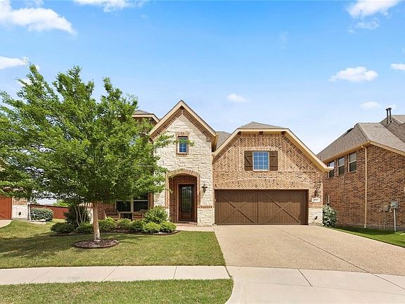 THIS HOME HAS FABULOUS CURB APPEAL AND IS SITUATED ON A QUIET CUL-DE-SAC!