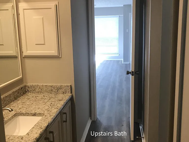 Upstairs Jack and Jill bathroom with shower.