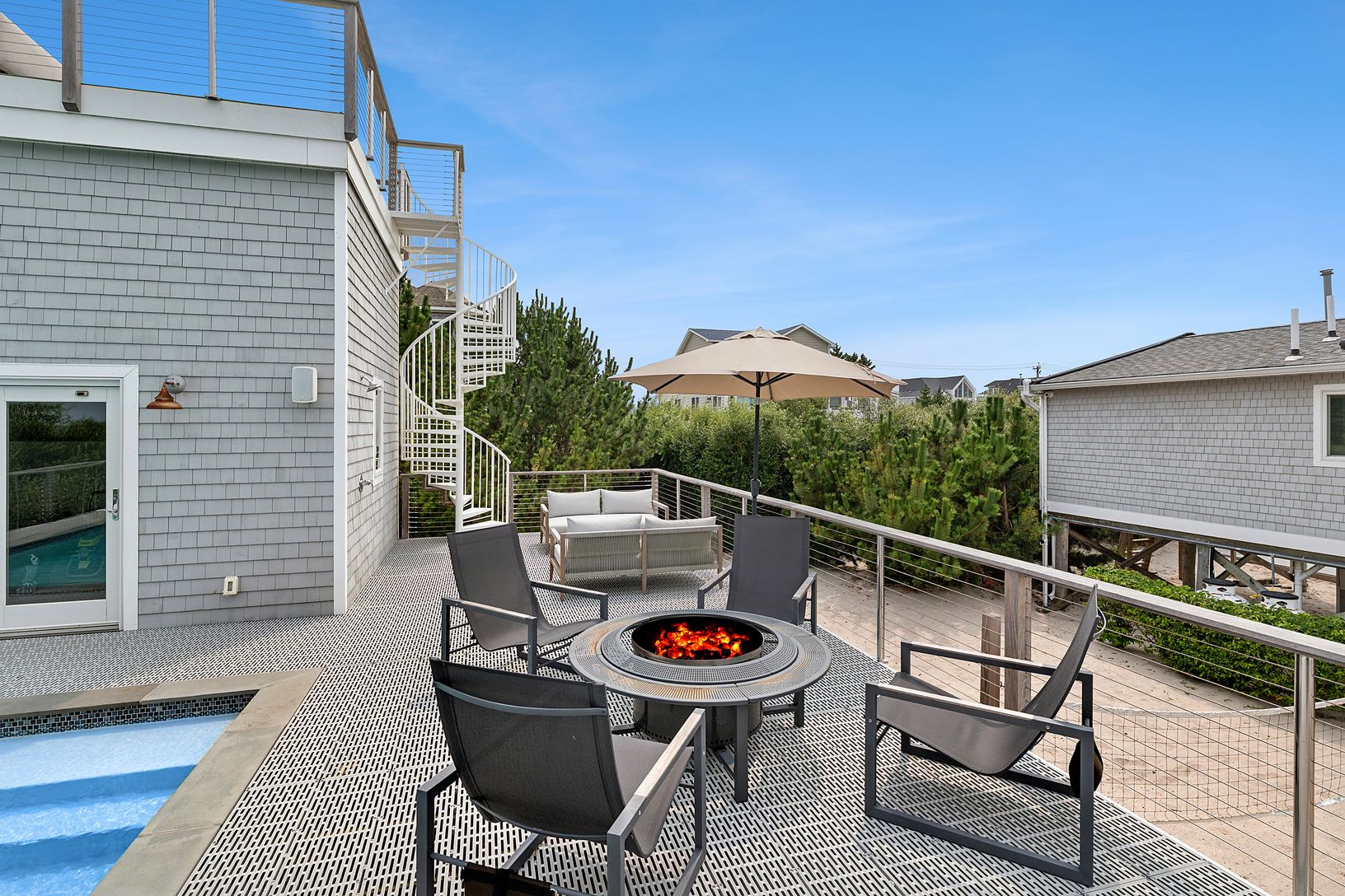 Patio / terrace, outdoor shower and pool house.