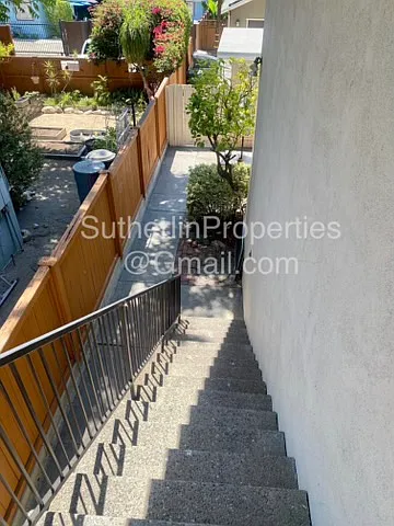 Stairs up to entry of Apartment C