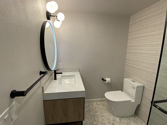 Four way lighting including a mirror which has an anti fog capability with smart touch