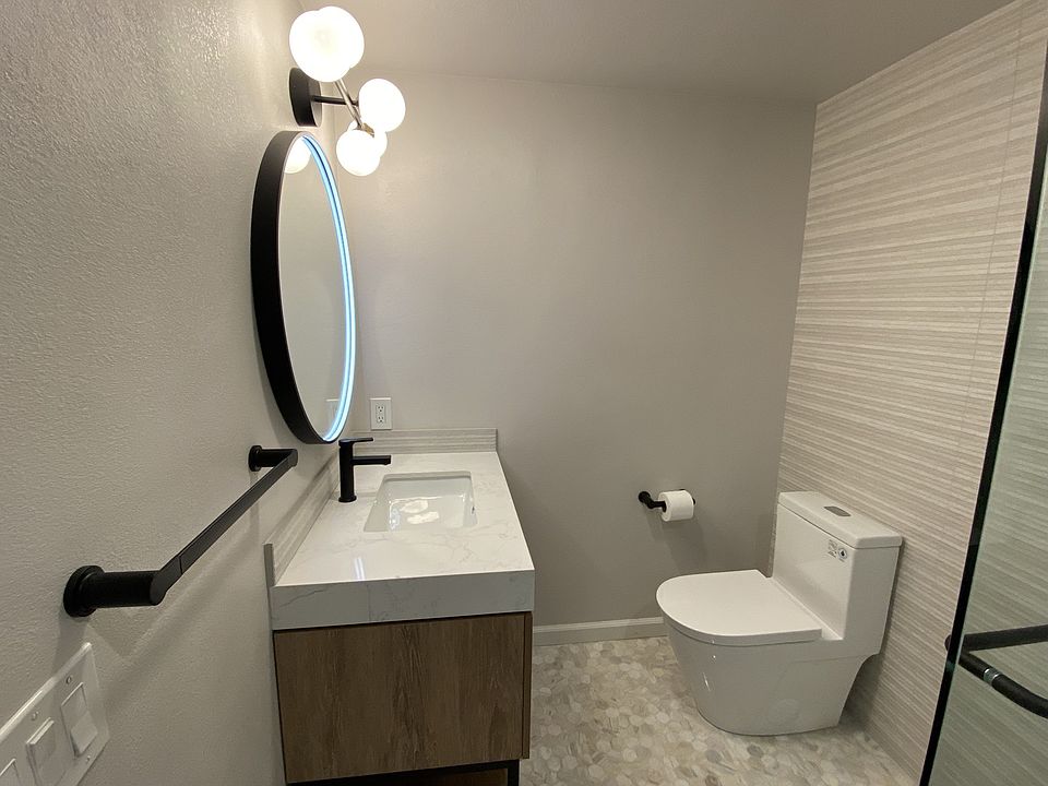 Four way lighting including a mirror which has an anti fog capability with smart touch