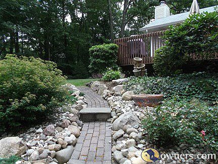 rock walk way to 1/2 acre and deck