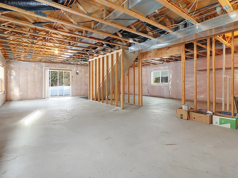Unfinished basement - lots of storage space. There are currently remnant carpet pieces down there for comfort.