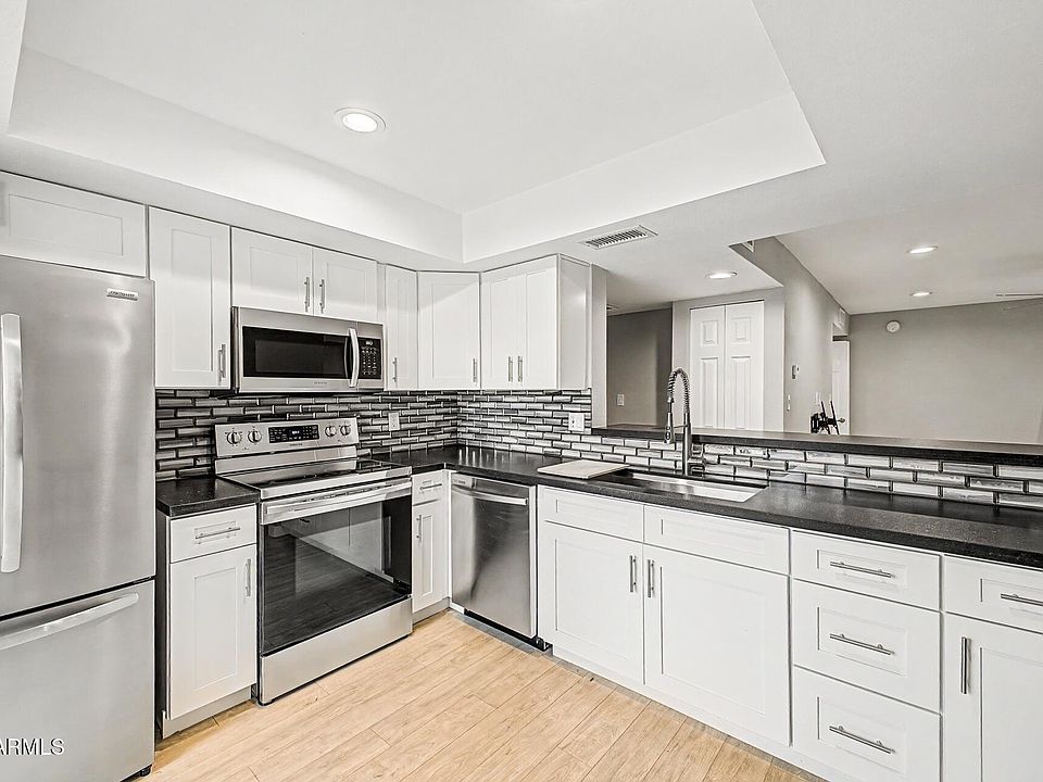 1st image of 9465 N 92nd St Unit 105