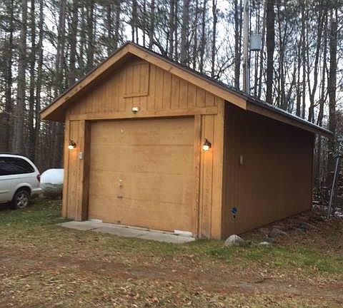 1.5 Car detached garage with work bench 