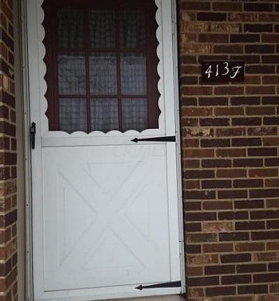 2nd image of 413 Williamsburg Ln NW APT F