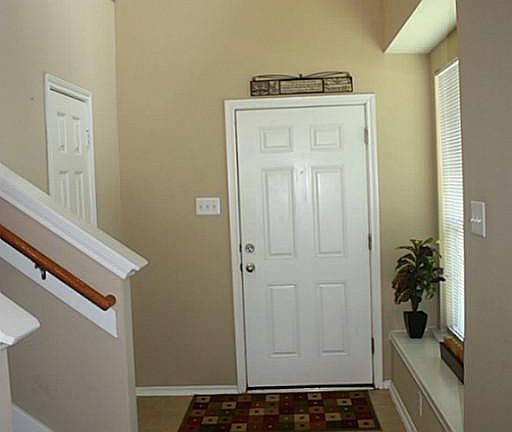 ENTRANCE HALL WITH POWDER ROOM