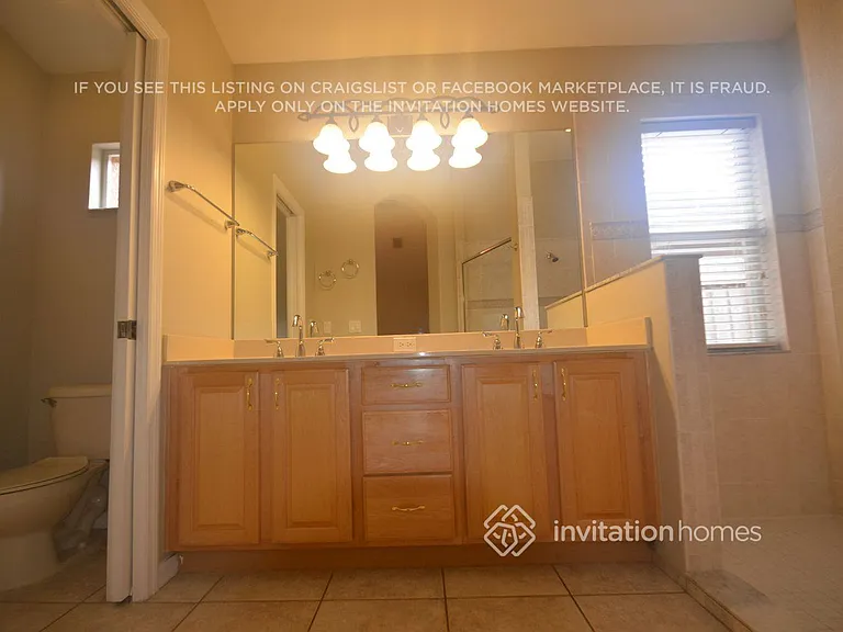 4704 Whispering Wind Ave — Photo 14