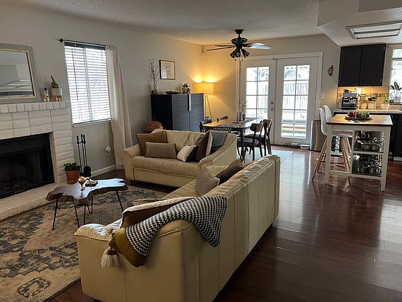 living room to dining room, kitchen and backyard