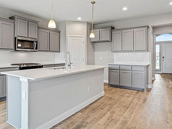 Kitchen - All Home and community information, including pricing, included features, terms, availability and amenities, are subject to change at any time without notice or obligation. All Drawings, pictures, photographs, video, square footages, floor plans, elevations, features, colors and sizes are approximate for illustration purposes only and will vary from the homes as built.